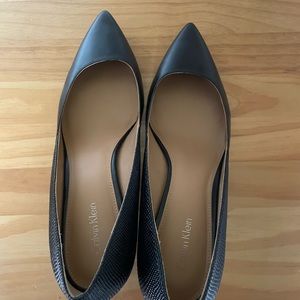 Black Calvin Klein kitten heels.